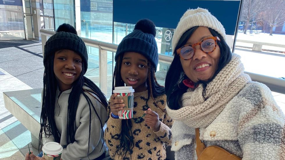 Dr. Pearlene Sterdivant brought her granddaughters Cameron and Maxine for a day of educational fun.