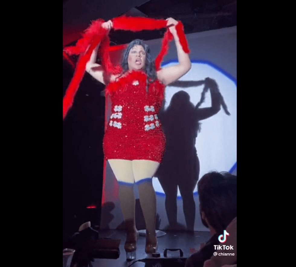 Drag queen Meatball as Santos