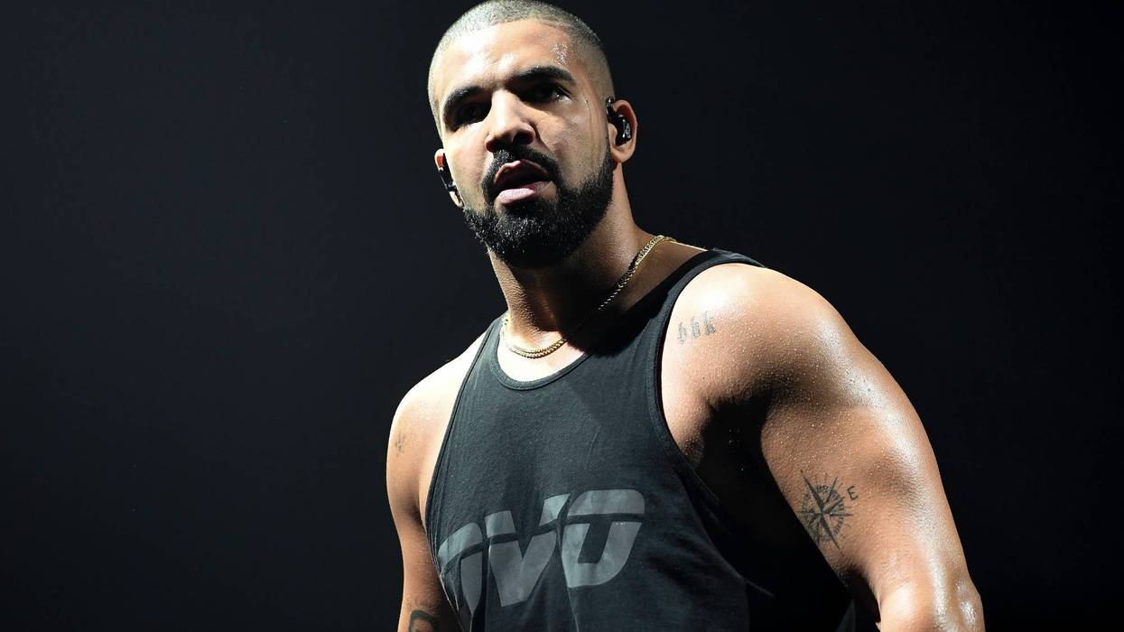 Drake in black tank top