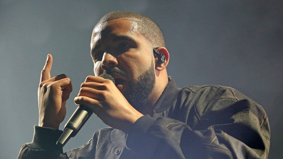 Drake attends celebratory 'Artist of the Decade' dinner with R&B legend Ron Isley