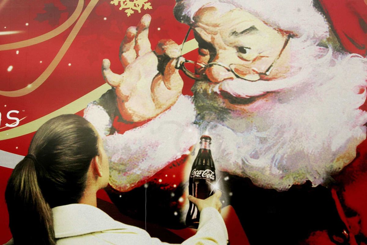 drawing of santa and a little girl giving him a bottle of coca cola
