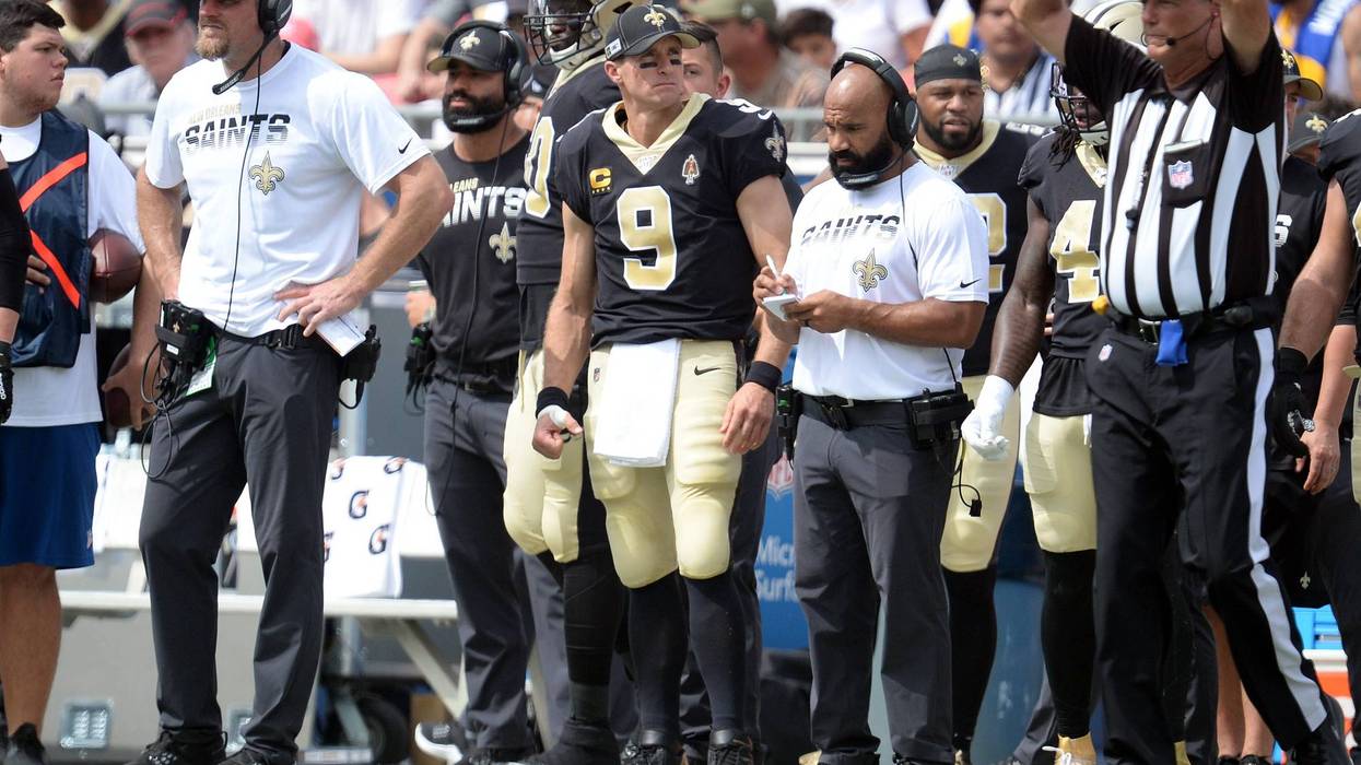 Drew Brees' hand is wrapped after he suffered an injury in the first quarter.