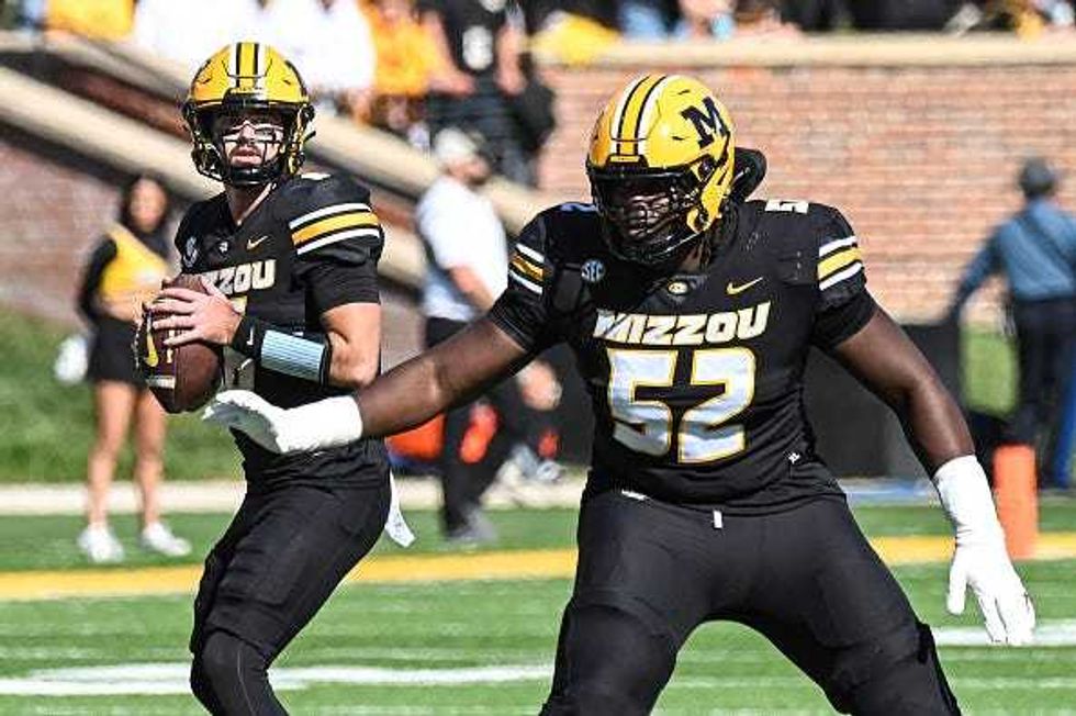 Drew Pyne and Marcus Bryant