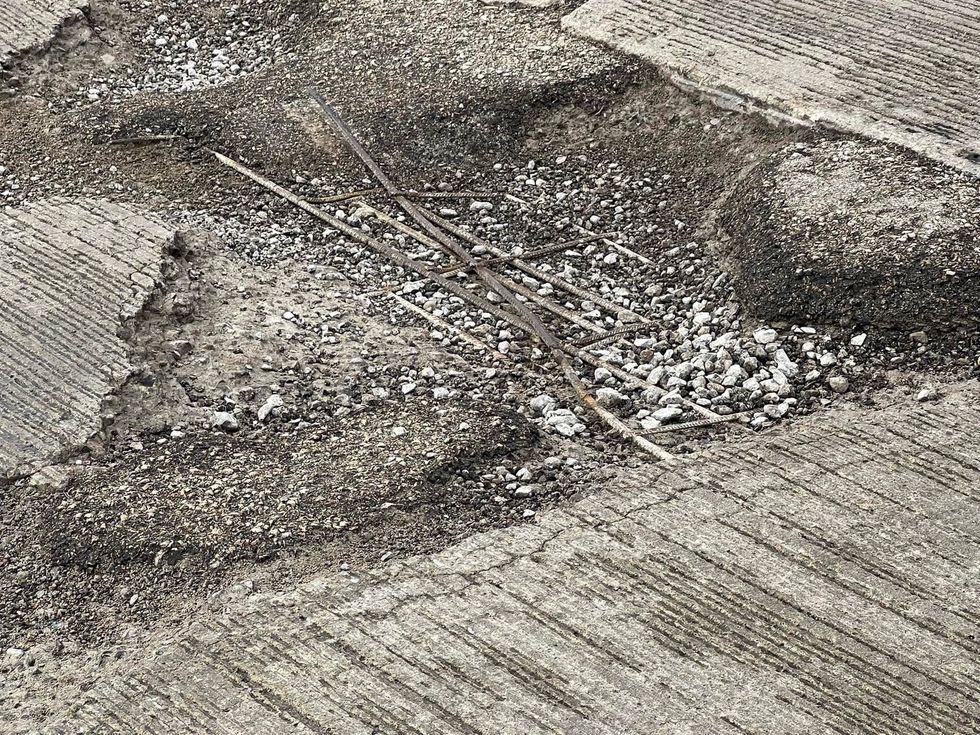 Drivers beware: a behemoth pothole has opened quite a crater on the northbound I-75 exit ramp to eastbound West Road in Wayne County, police said on Friday.