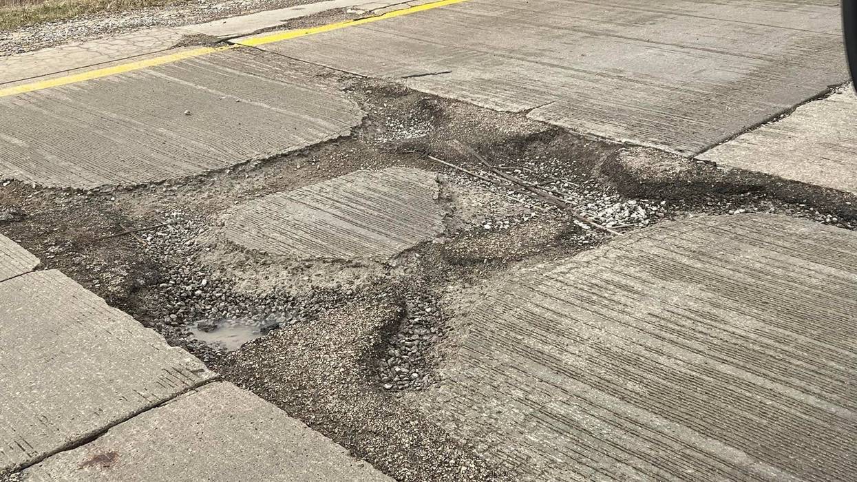 Drivers beware: a behemoth pothole has opened quite a crater on the northbound I-75 exit ramp to eastbound West Road in Wayne County, police said on Friday.