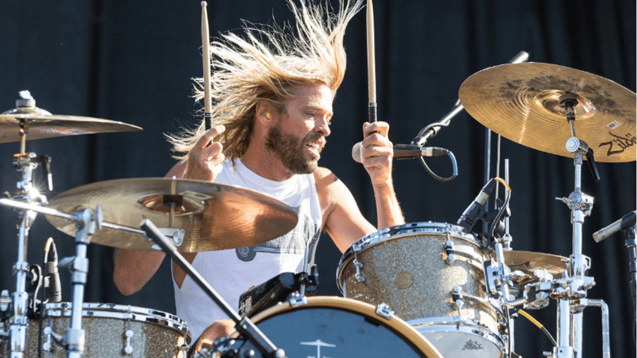 Drummer Taylor Hawkins of Foo Fighters perform as Chevy Metal at Douglas Park during Riot Fest Music Festival