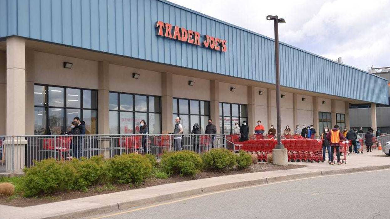 Due to tightening regulations, lines at stores are forming outside to facilitate social distancing while shopping, like at the Trader Joe's on April 10, 2020 in Edgewater, New Jersey. COVID-19 has spread to countries throughout the world, claiming nearly 103,000 lives and infecting nearly 1.7 million people.