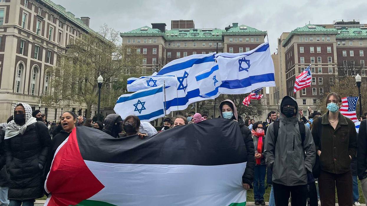 Dueling protests were a common sight at the campus in the spring, as seen here on April 18. The university is trying to cool tensions as the fall semester kicks off