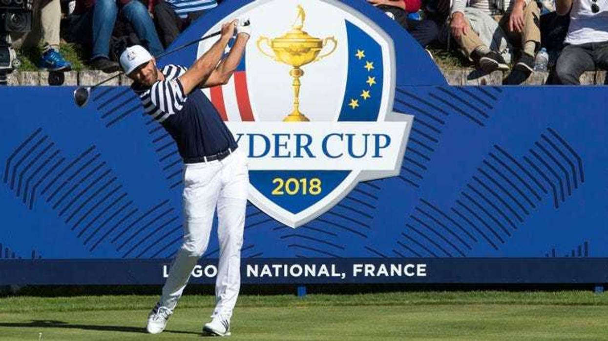 Dustin Johnson tees off on the 17th hole during a Ryder Cup practice round on Sept. 27, 2018, at Le Golf National in Saint-Quentin-en-Yvelines, France.