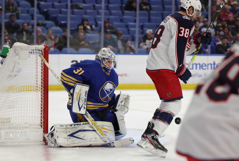 Dustin Tokarski and Boone Jenner