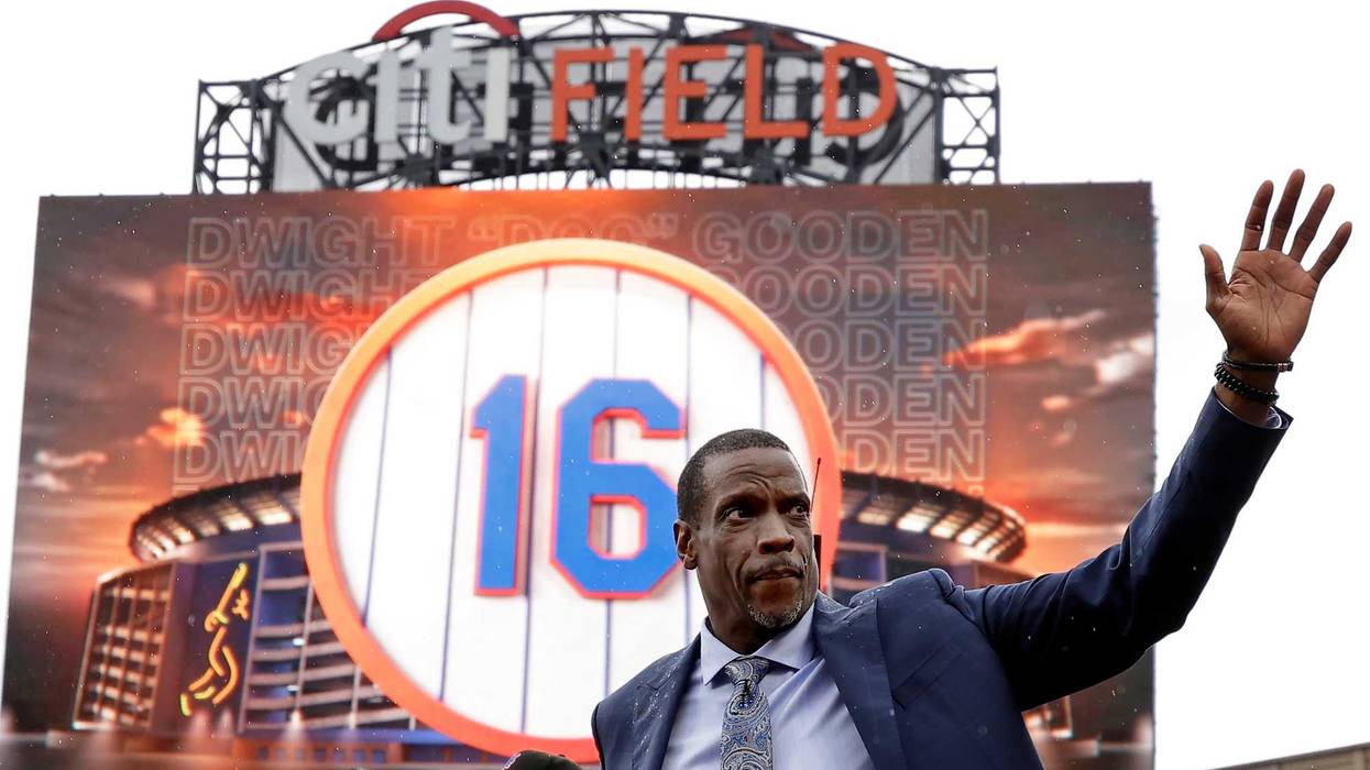 Dwight "Doc" Gooden acknowledges the fans during a pregame ceremony to retire his jersey number by the New York Mets before a game against the Kansas City Royals at Citi Field on April 14, 2024 in Queens.