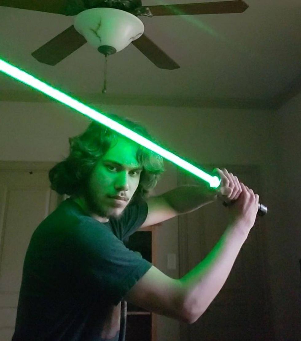 Dylan Dorrell drew out his own schematics to design this working lightsaber in his favorite color, green.