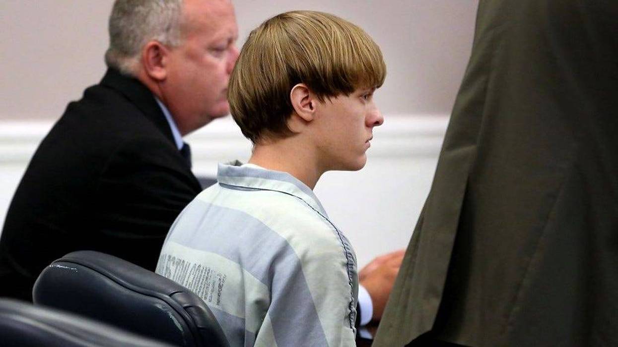 Dylann Roof (C), the suspect in the mass shooting that left nine dead in a Charleston church last month, appears in court July 18, 2015 in Charleston, South Carolina.