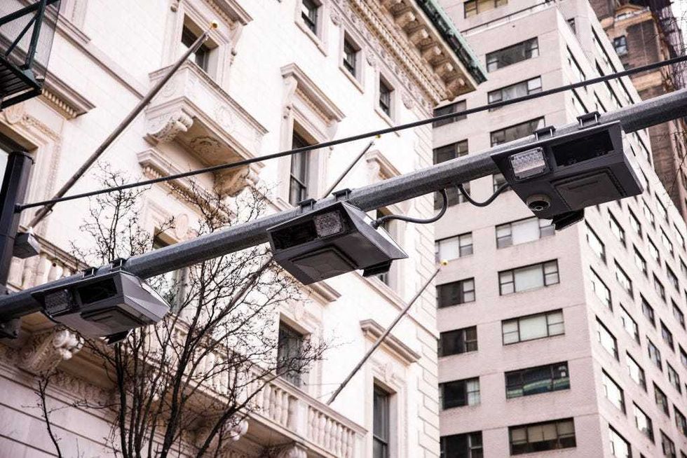 E-ZPass readers and license plate-scanning cameras are seen above on 5th Avenue as congestion pricing takes effect in New York City on Jan. 5, 2024.
