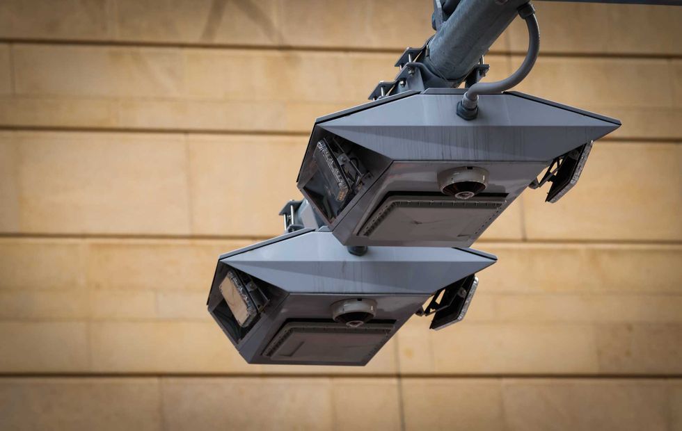 E-ZPass readers and license plate-scanning cameras are seen on 42nd Street in Manhattan on February 19, 2025