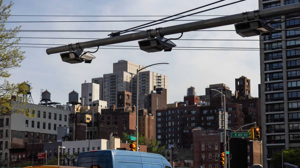 E-ZPass readers and license plate-scanning cameras over Second Avenue in New York.