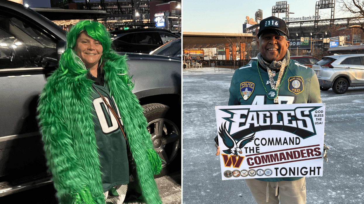Eagles fans Kim Righi (left) and Floyd White III at the South Philadelphia Sports Complex.