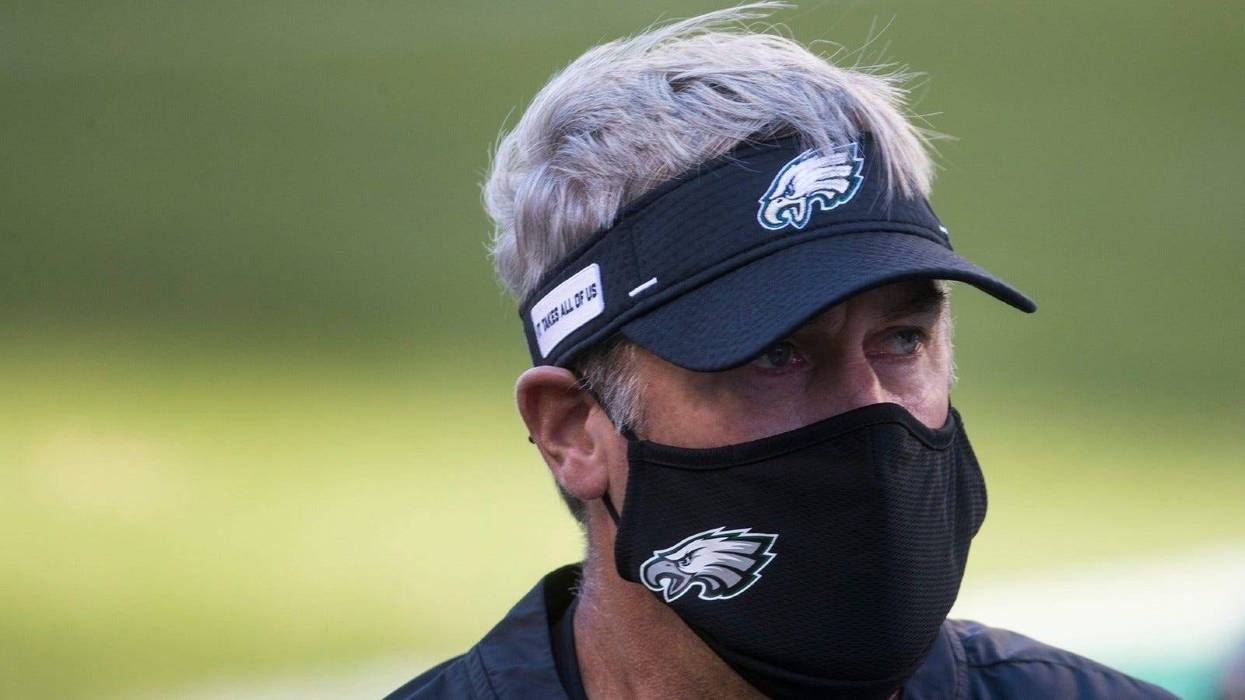 Eagles head coach Doug Pederson walks off the field