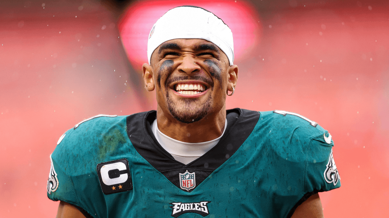 Eagles quarterback Jalen Hurts in green uniform
