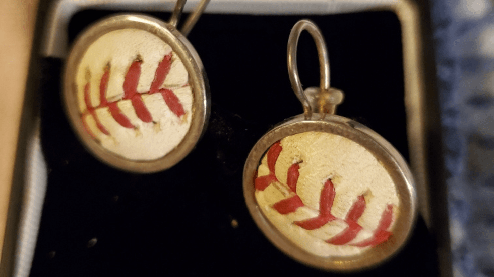 earrings made from a baseball Roy Halladay threw
