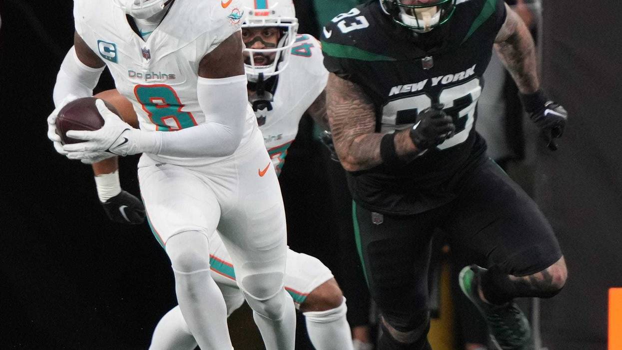 East Rutherford, NJ November 24, 2023 -- Jevon Holland of Miami returned thisinterception for a 100 yard TD in the first half as the Miami Dolphins defeated the NY Jets 34-13 at MetLife Stadium