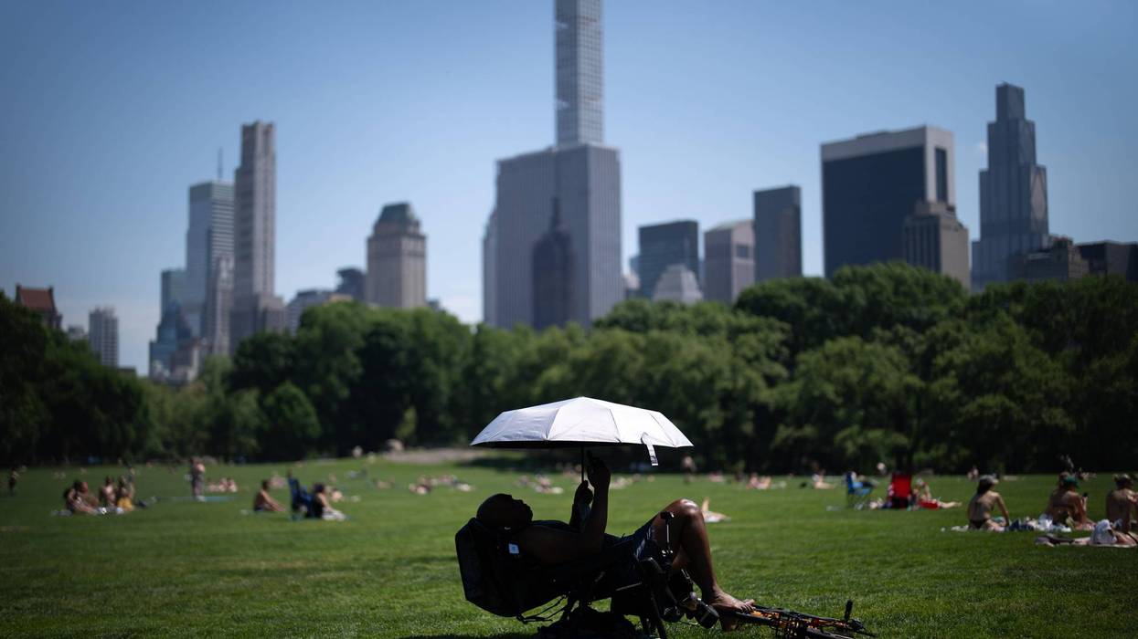 Eastern US sweats through another hot day before rain, cold move in
