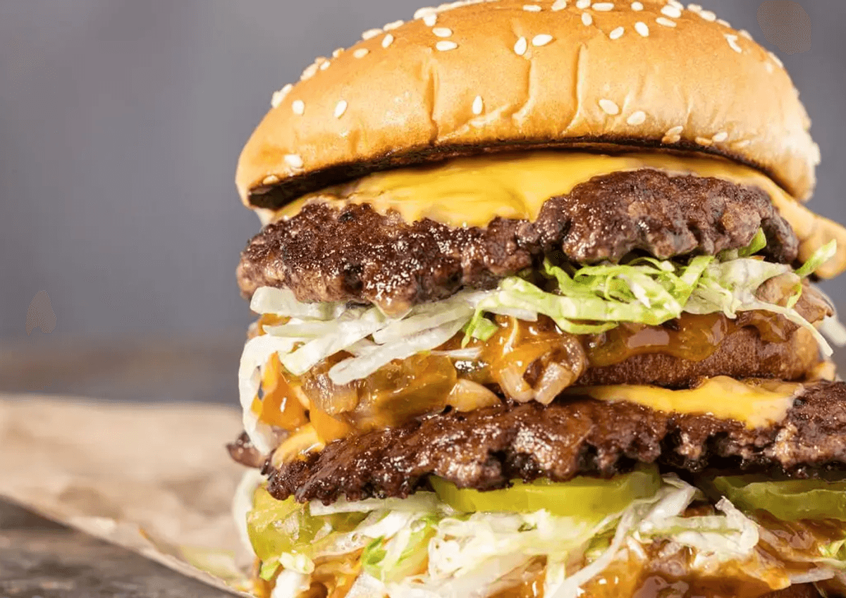 Eating a cheeseburger and other processed meats is linked to shaving minutes off life expectancy, according to a new analysis of diet and long-term health outcomes.