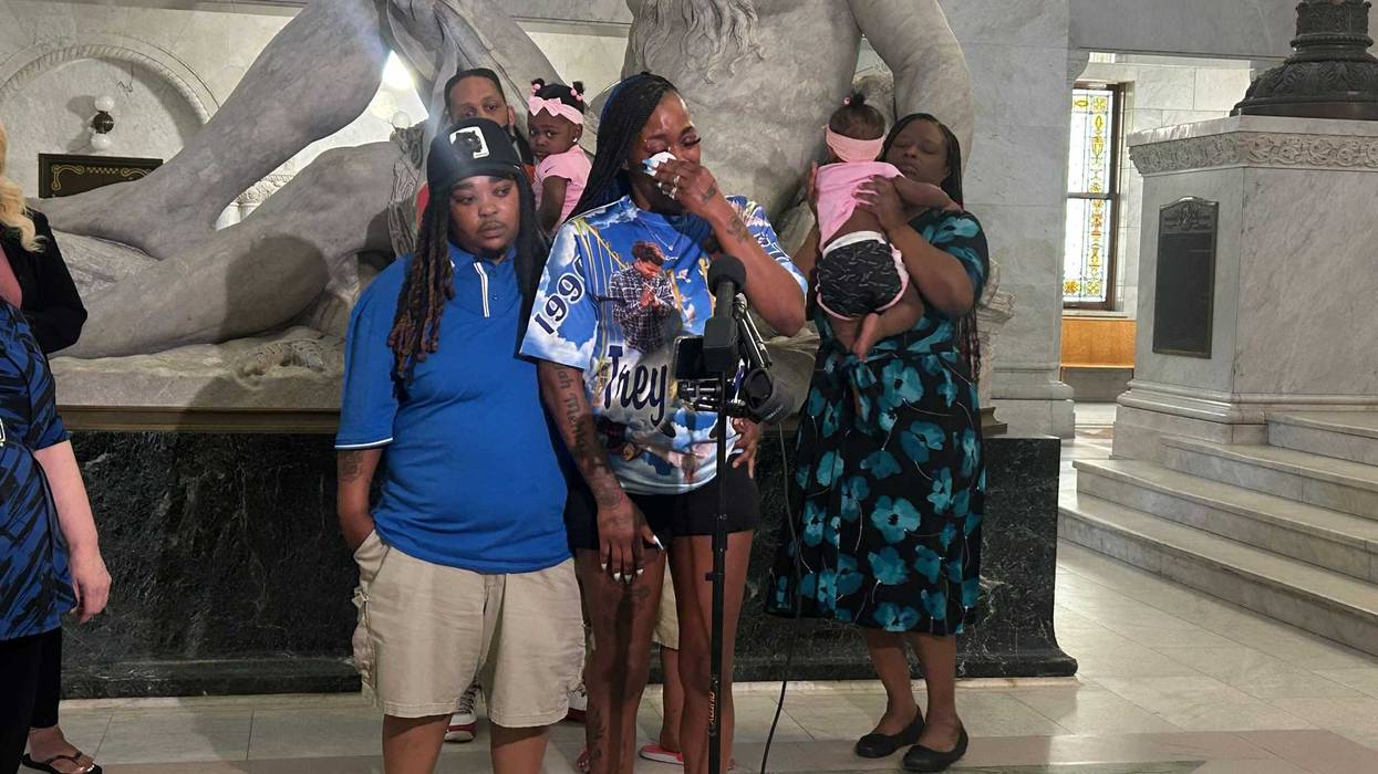 Ebony Dobbins, who claims claims officers entered their family home through an open window around 1:00 a.m. in north Minneapolis after neighbors had called police about her escaped dog.