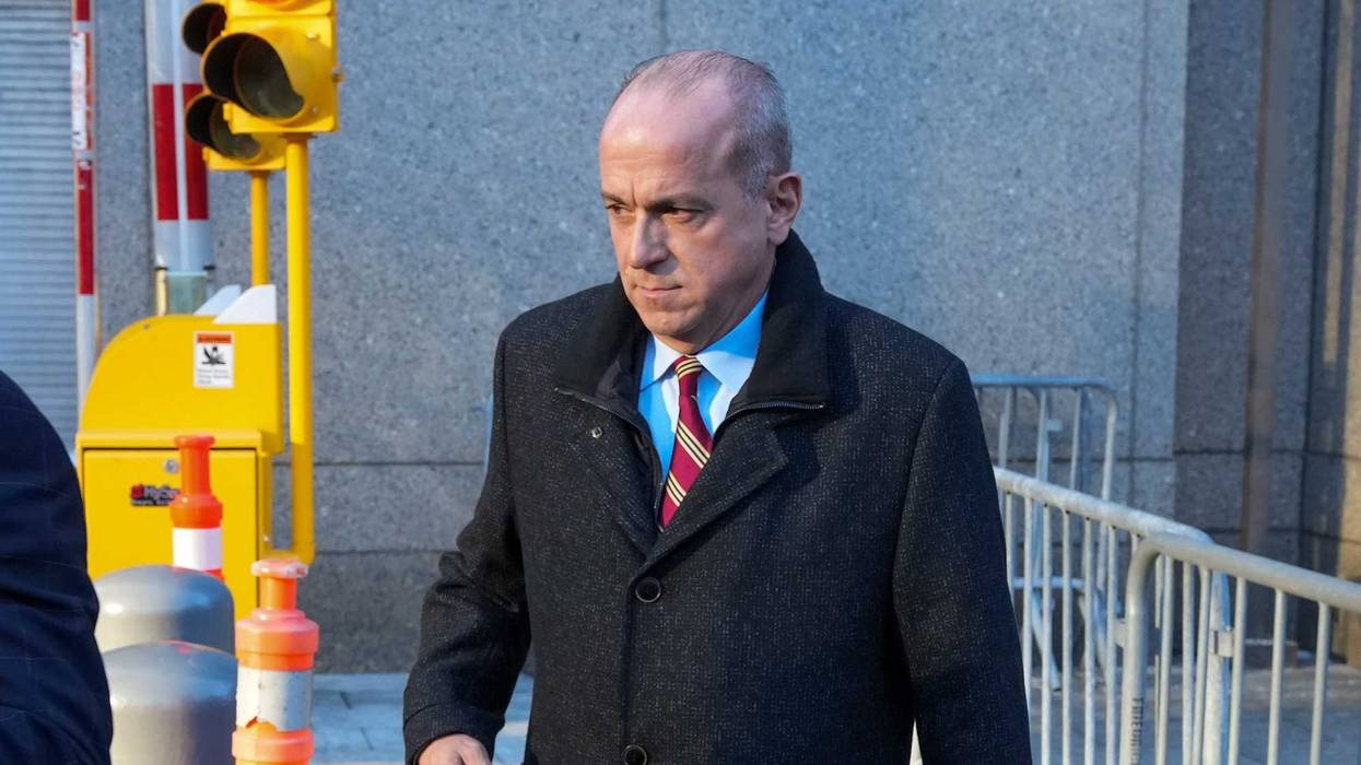 Ed Mullins departs court in February 2022