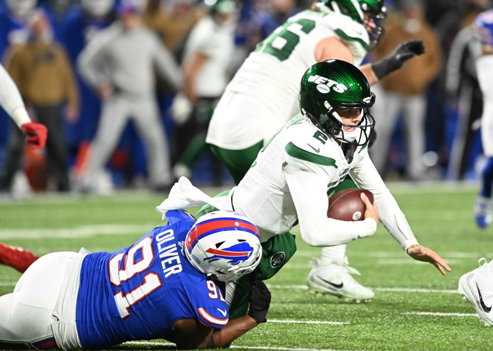 Ed Oliver and Zach Wilson