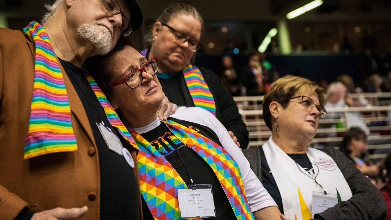 Ed Rowe, left, Rebecca Wilson, Robin Hager and Jill Zundel, react to the defeat of a proposal that would allow LGBT clergy and same-sex marriage within the United Methodist Church at the denomination’s 2019 Special Session of the General Conference in St.