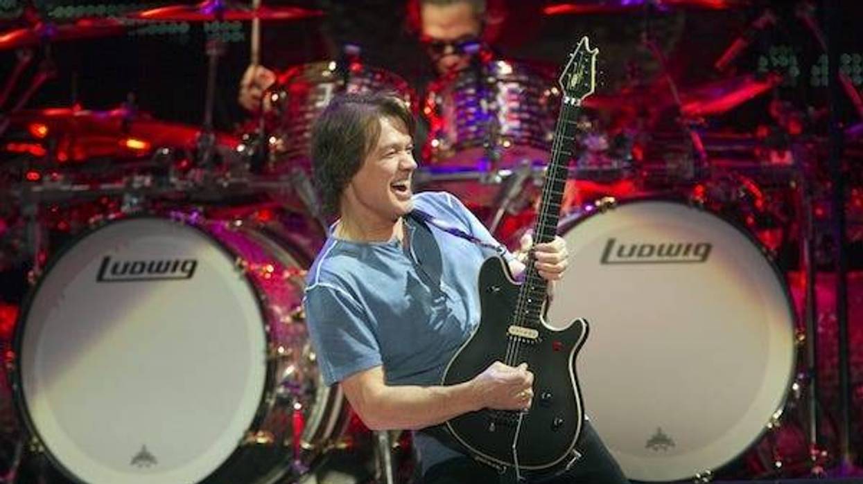 Eddie Van Halen plays a solo at Bankers Life Fieldhouse during the set of Van Halen, Indianapolis, Wednesday, February 22, 2012