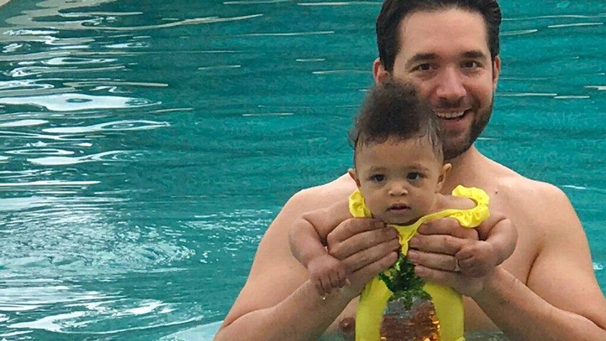Edelman communications marketing firm, Alexis Ohanian, founder of the social media company Reddit, poses for a photo with his daughter Olympia.
