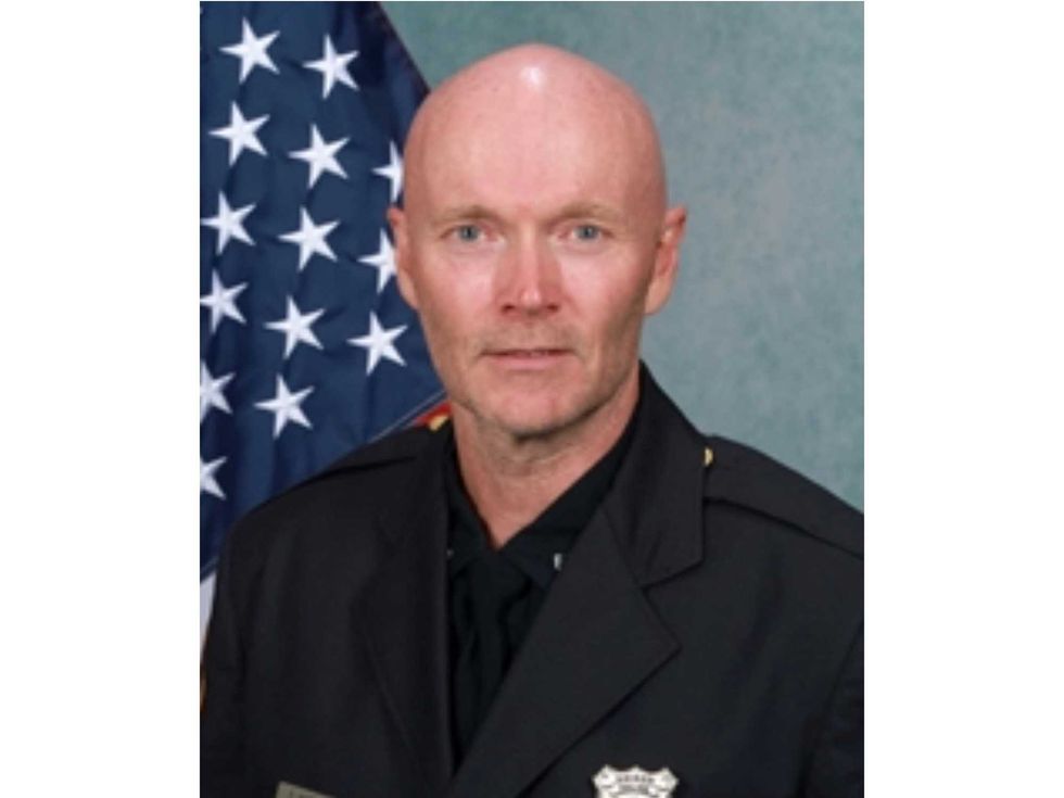 Edison Police Officer Phil Smith caught a fugitive after a highspeed chase on Dec. 3, 2023.