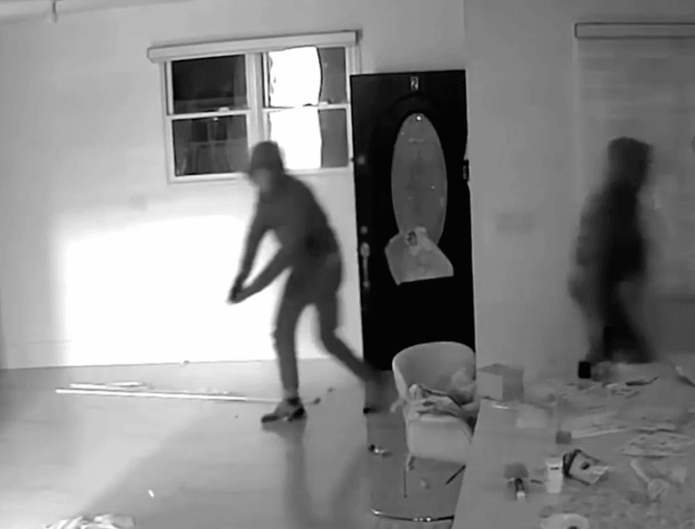 Eerie surveillance video shows the men creeping into the home at 12:45 a.m. on Dec. 18