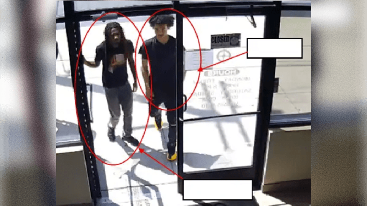 Ehmani Davis and Sheldon Thomas walking into store
