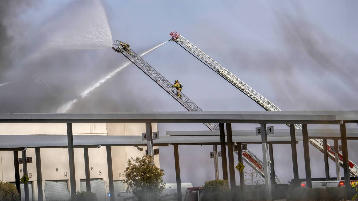El Paso firefighters battle a fire at the Sun Metro Operations Center in East El Paso. The fire started around 1 p.m. at 10151 Montana Ave. near Wedgewood Drive, El Paso Fire Department officials said.