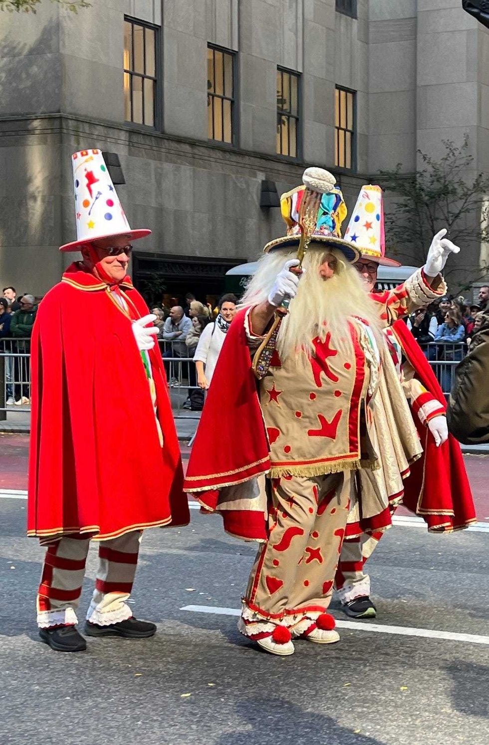 Elaborately costumed marchers along the parade