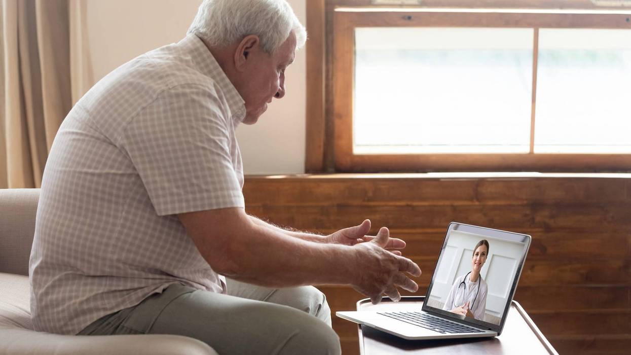 elderly man has telehealth appointment