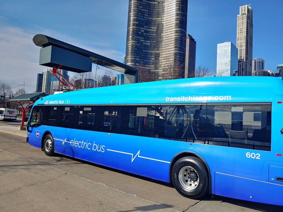 Electric buses at the quick-charging station at Navy Pier. In about five to ten minutes, these in-route stations can charge a bus for about 8% to 10% of their capacity.