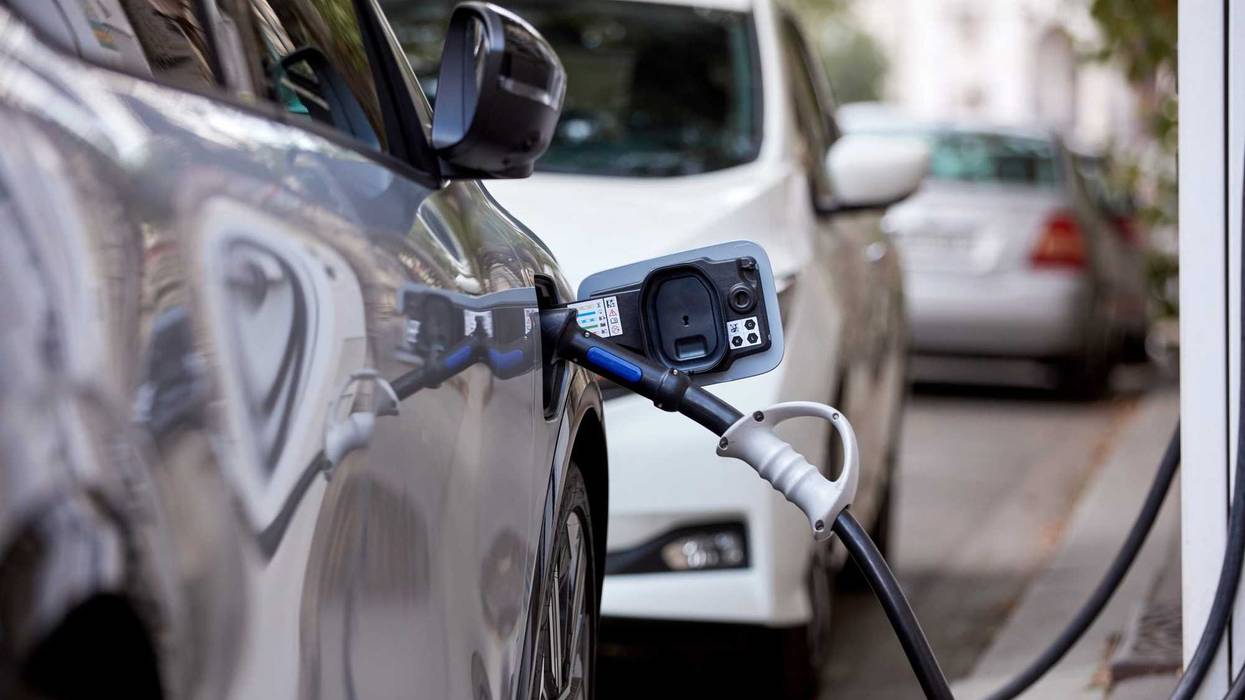 Electric vehicle charging on a public charger.