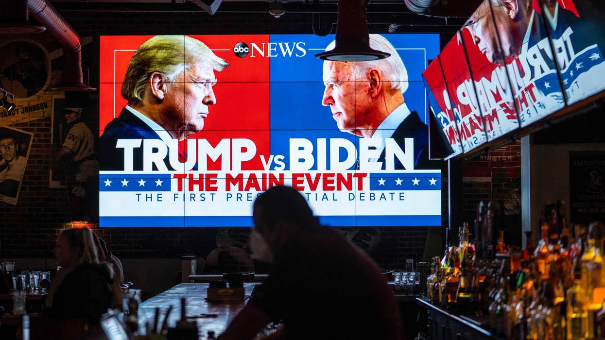elevision screens airing the first presidential debate are seen at Walters Sports Bar on September 29, 2020 in Washington, United States.