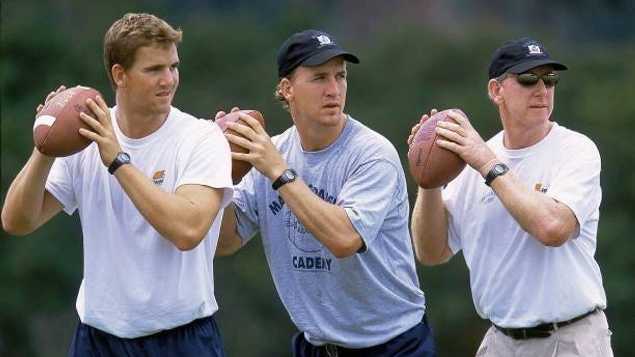 Eli Manning, Peyton Manning, Archie Manning at the Manning Passing Academy