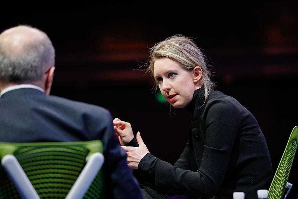 Elizabeth Holmes (R) and Alan Murray speak at the Fortune Global Forum at the Fairmont Hotel on November 2, 2015 in San Francisco, California.