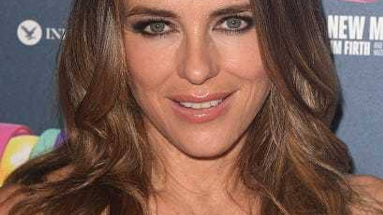 Elizabeth Hurley posts topless photo