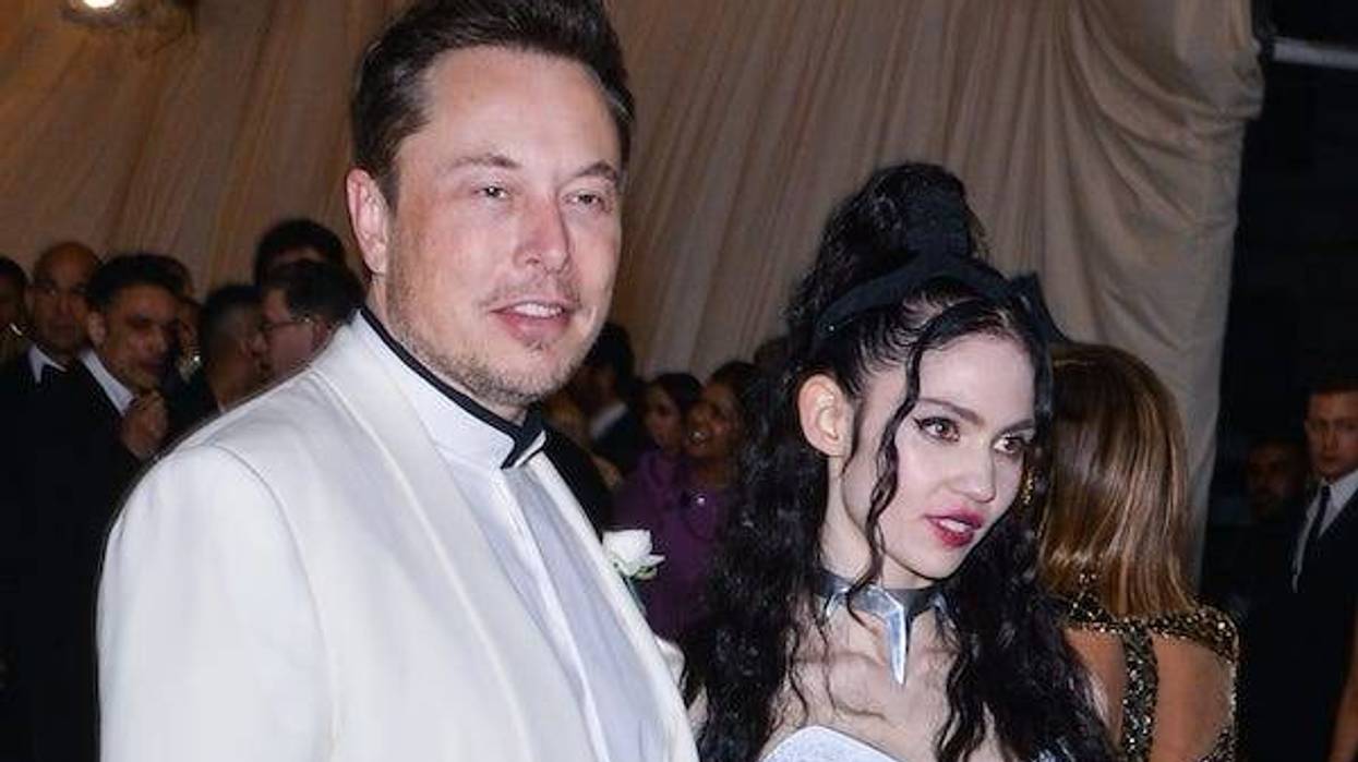 Elon Musk and Claire Elise Boucher aka Grimes walking on the red carpet at The Metropolitan Museum of Art Costume Institute Benefit