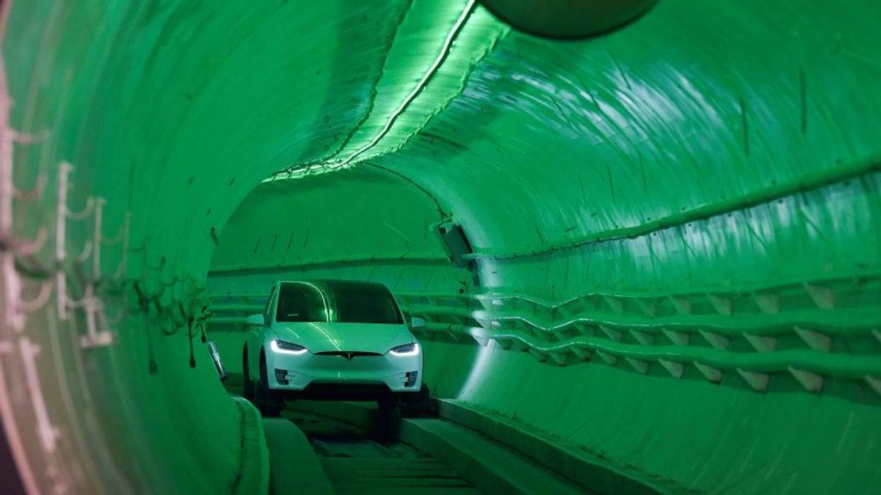 Elon Musk, co-founder and Chief Executive Officer of Tesla Inc., arrives in a modified Tesla Model X electric vehicle during an unveiling event for The Boring Company Hawthorne test tunnel on December 18, 2018, in Hawthorne, California.