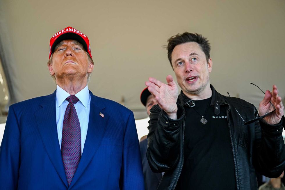 Elon Musk speaks with U.S. President-elect Donald Trump as they watch the launch of the sixth test flight of the SpaceX Starship rocket on November 19, 2024 in Brownsville, Texas. SpaceX