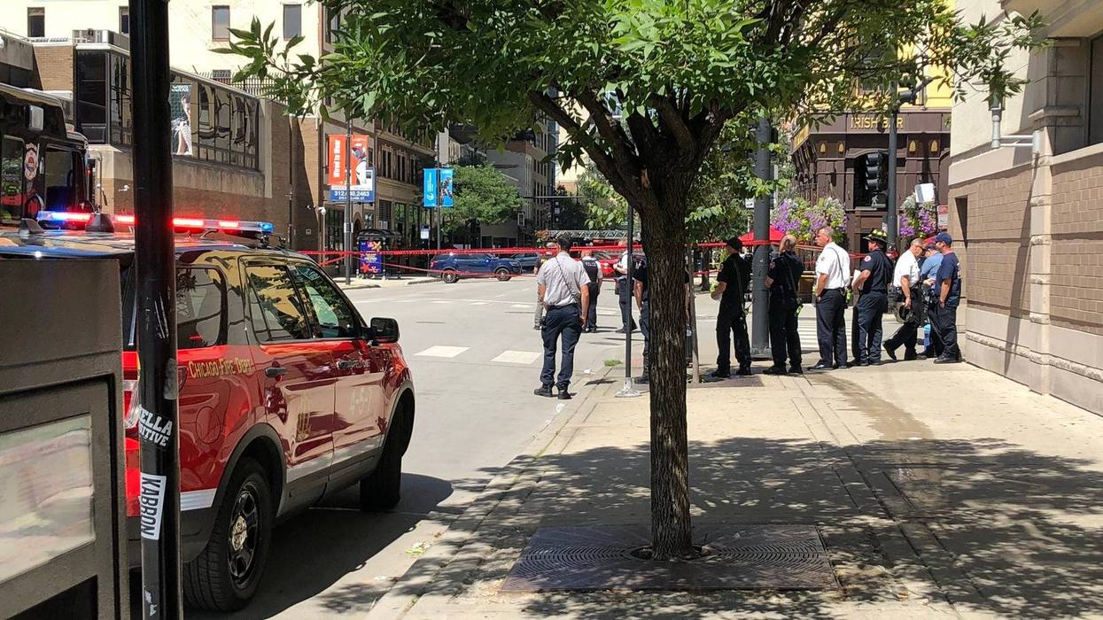 Emergency crews on site during standoff between man on roof and SWAT teams.