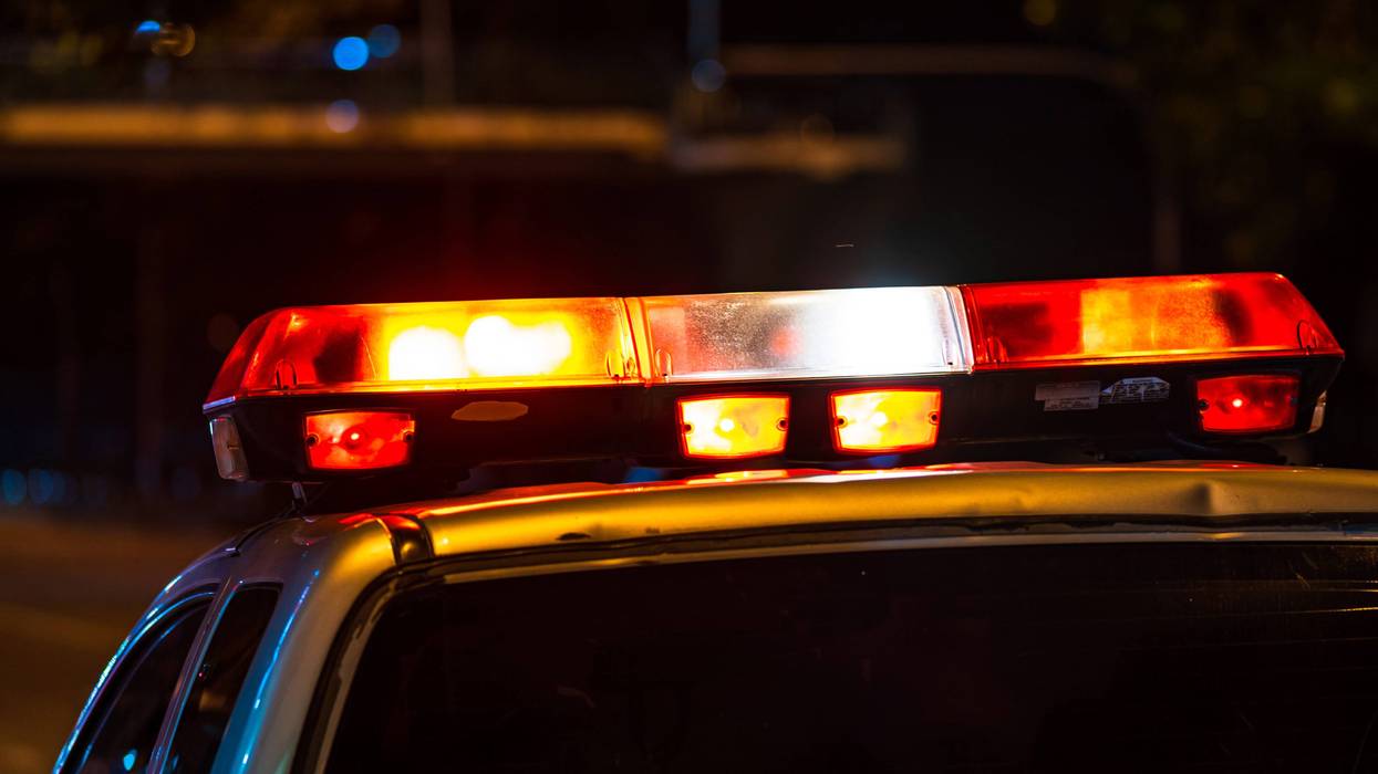 Emergency light, Red light flasher atop of a police car at night